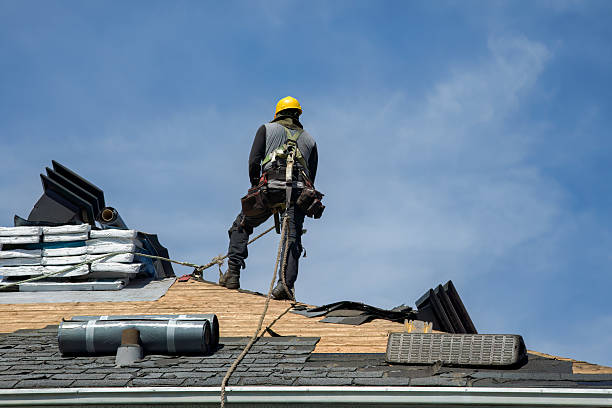Professional Gutter Installation technician working in Hillsboro, MS